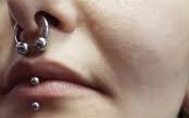 TATOUAGE ET PIERCING : Marqueurs corporels, marqueurs Psychologiques et sociaux TATOUAGE ET PIERCING : Marqueurs corporels, marqueurs Psychologiques et sociaux